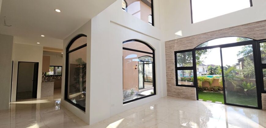 Modern Mediterranean Masterpiece with Atrium and Garden