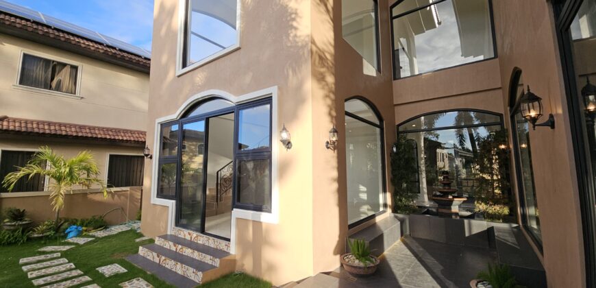 Modern Mediterranean Masterpiece with Atrium and Garden